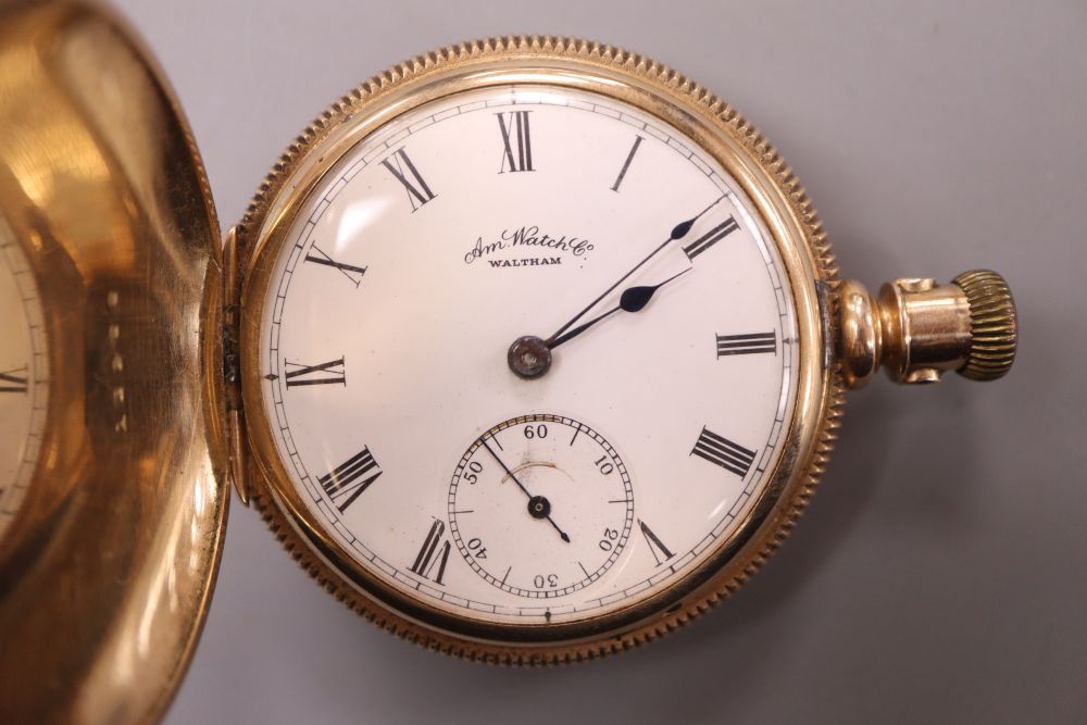 An American 14k yellow metal Waltham hunter keyless pocket watch with Roman dial and subsidiary seconds,